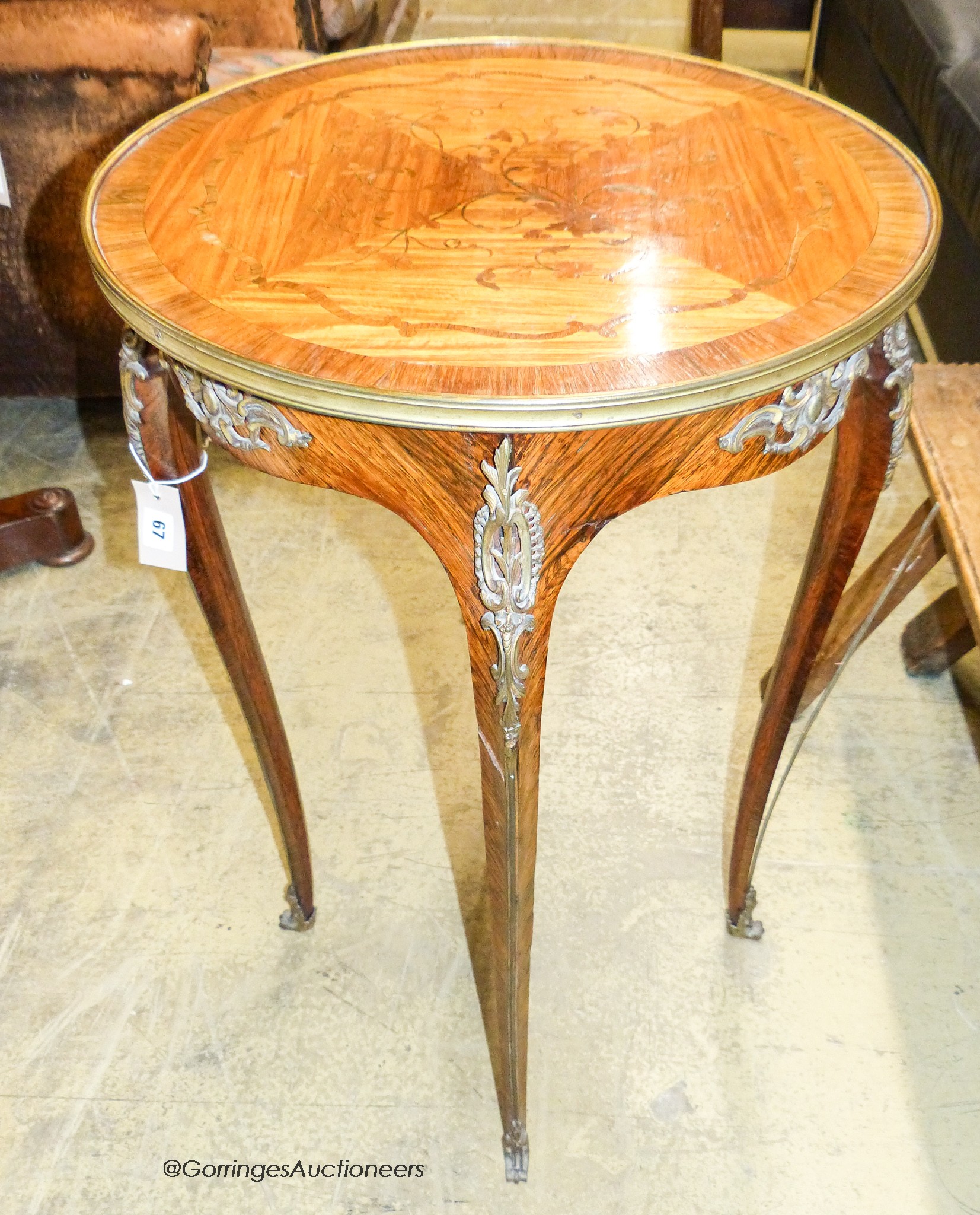 A Louis XVI style marquetry inlaid circular kingwood occasional table, diameter 50cm, height 76cm